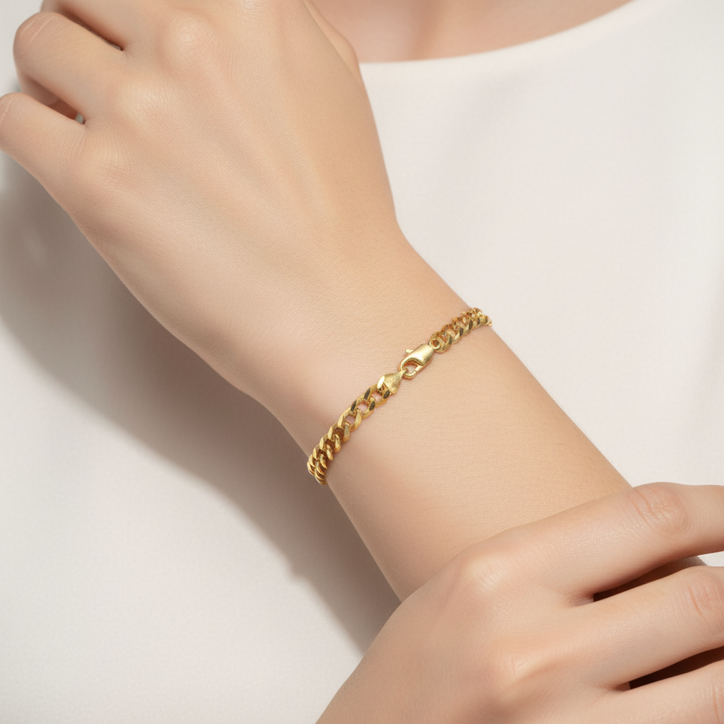 Yellow Gold Curb Chain Bracelet on Female Model