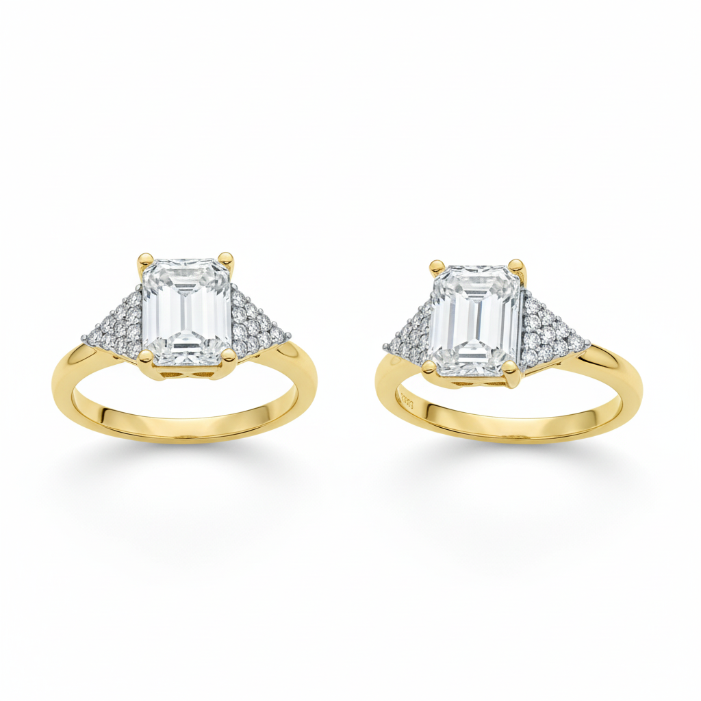 Yellow gold emerald ring on white background