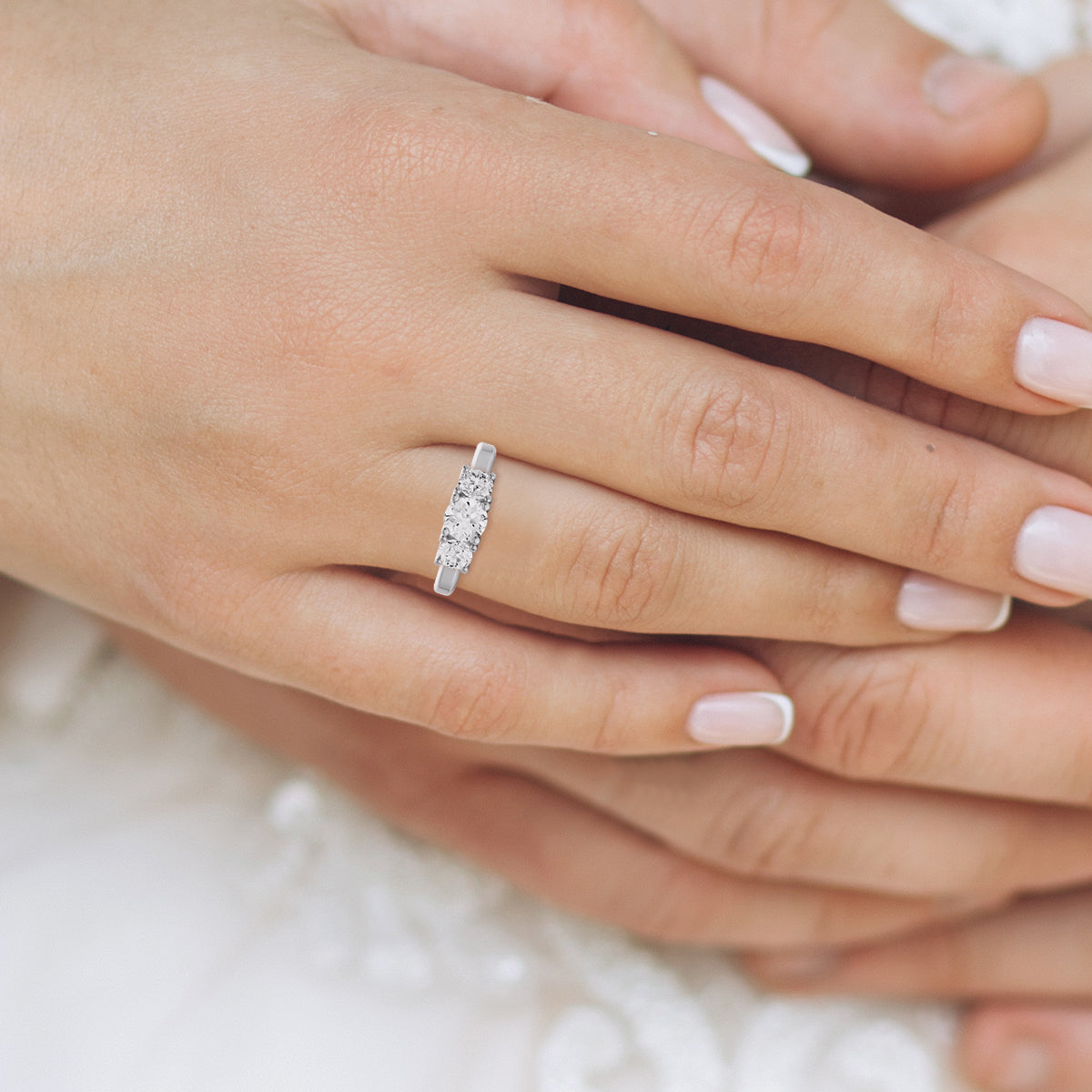 Round Three-Stone 2 CTW Lab Grown Diamond Ring in 14 Karat Gold Basket Setting