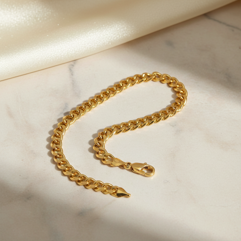 Yellow Gold Curb Chain Bracelet on Premium Background